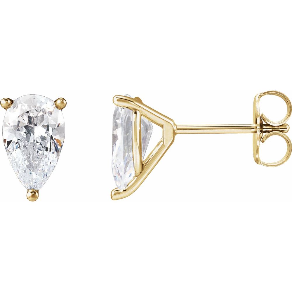 A pair of yellow gold stud earrings, one showing a pear-cut clear gemstone in a four-prong setting and the other showing a triangular marquise-cut clear gemstone in a three-prong setting with a post and butterfly back.